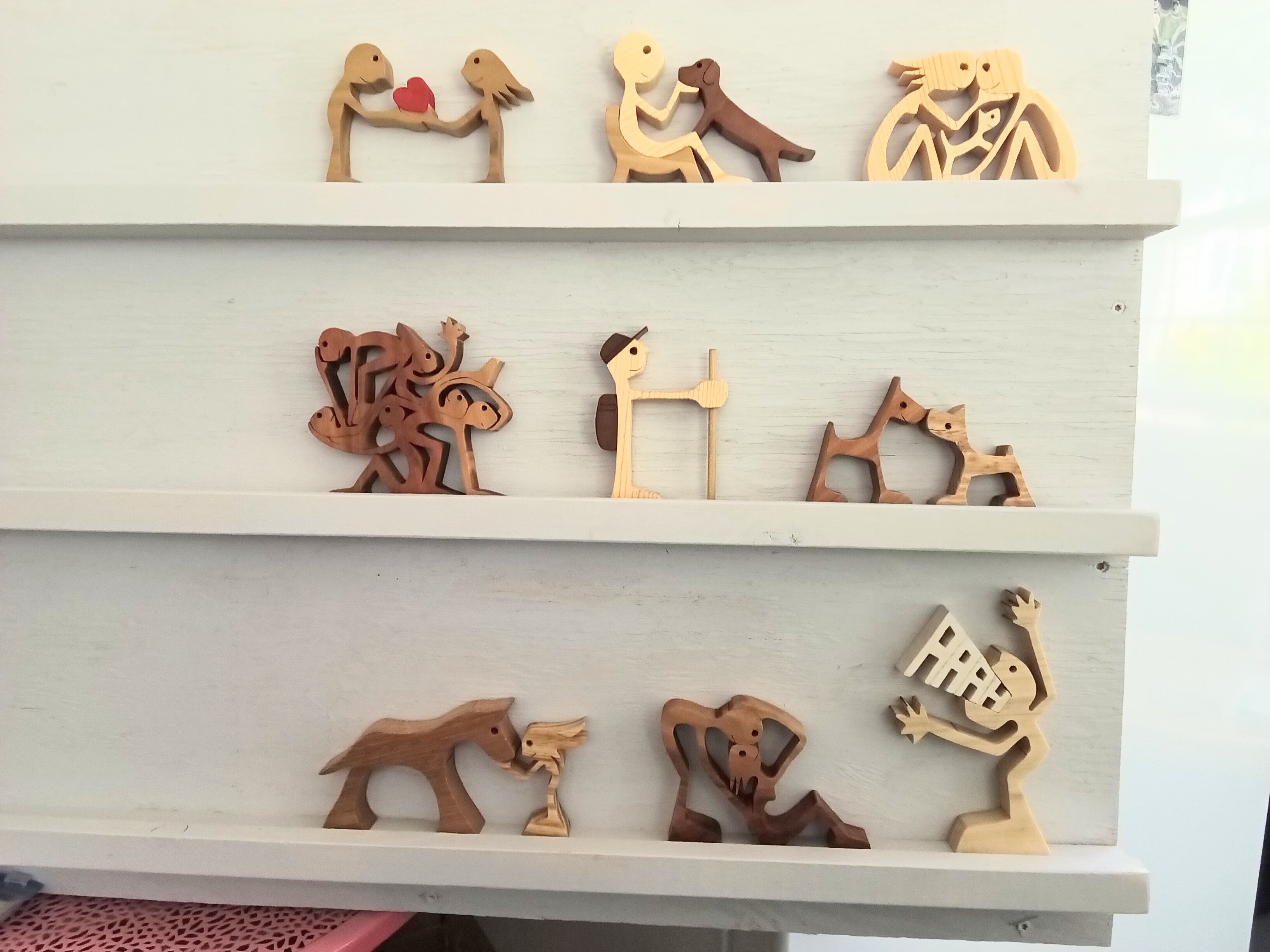Wooden people and pets